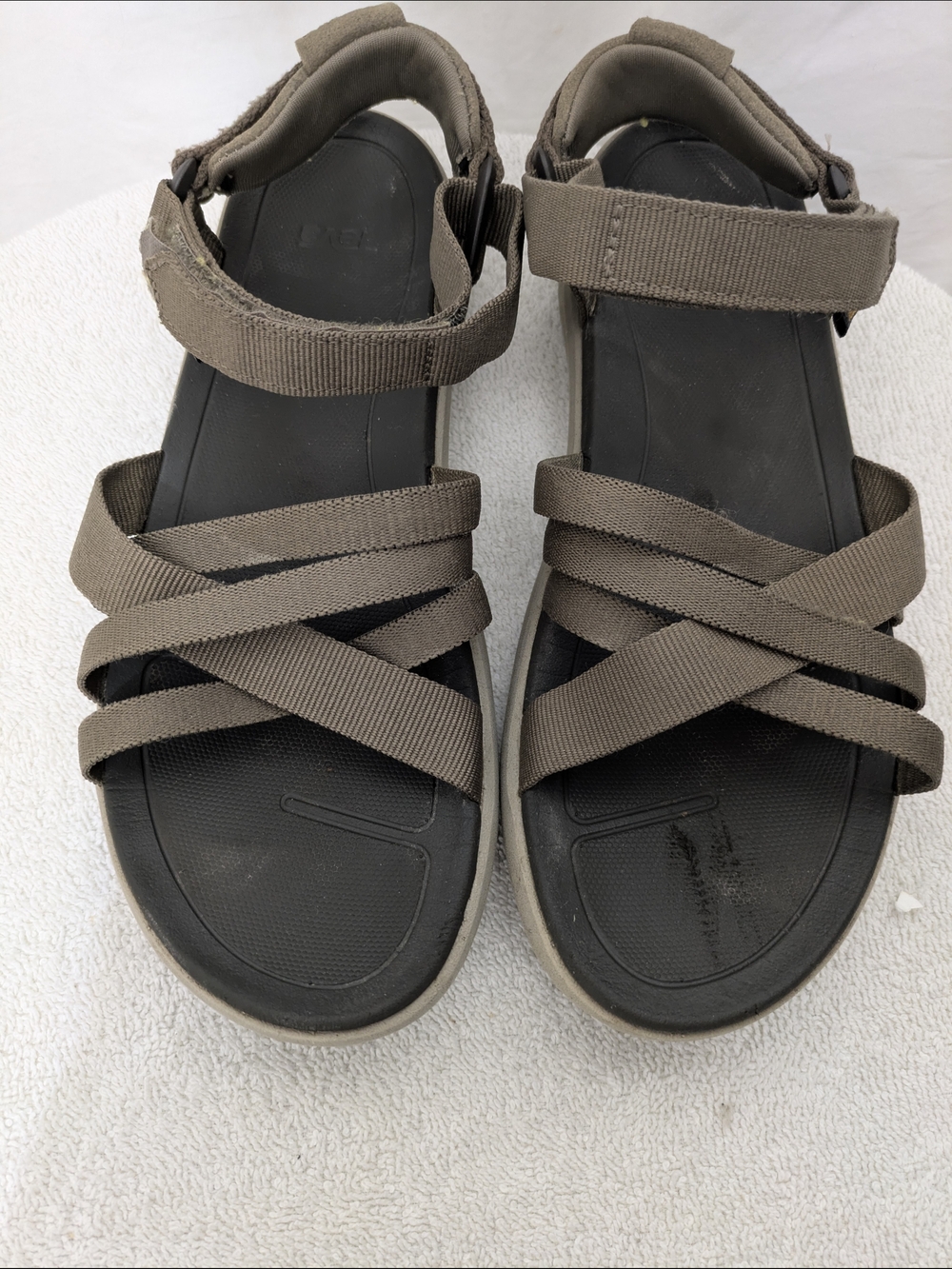 Classic Teva sport sandals in a versatile brown/taupe color.